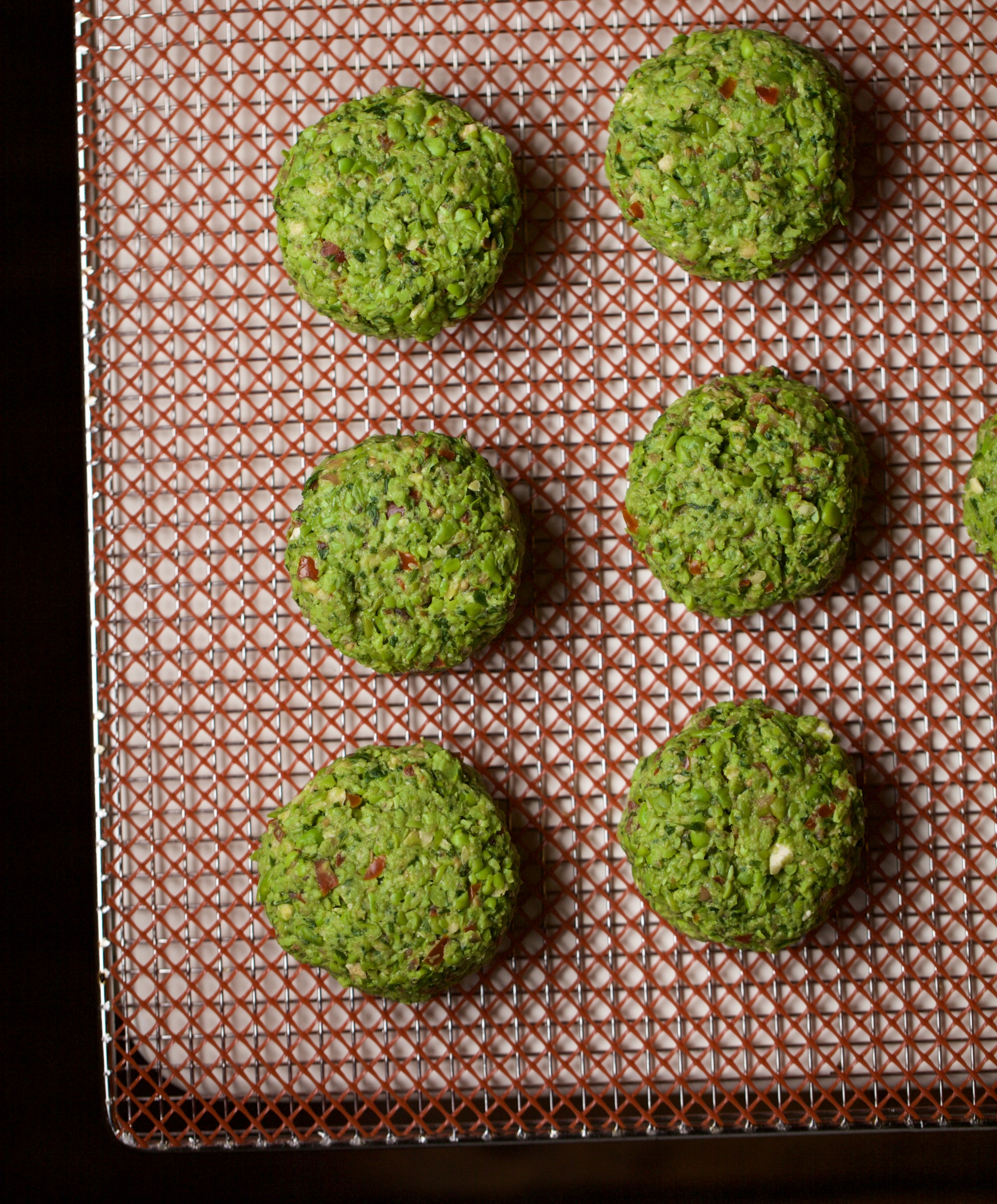 Pea and mint croquettes on a dehydrator sheet