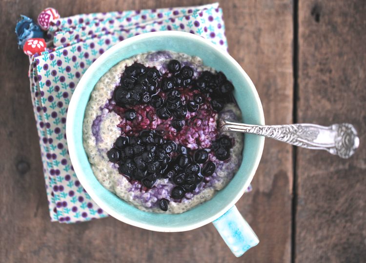 Coconut milk chia in a blue bowl with blueberries