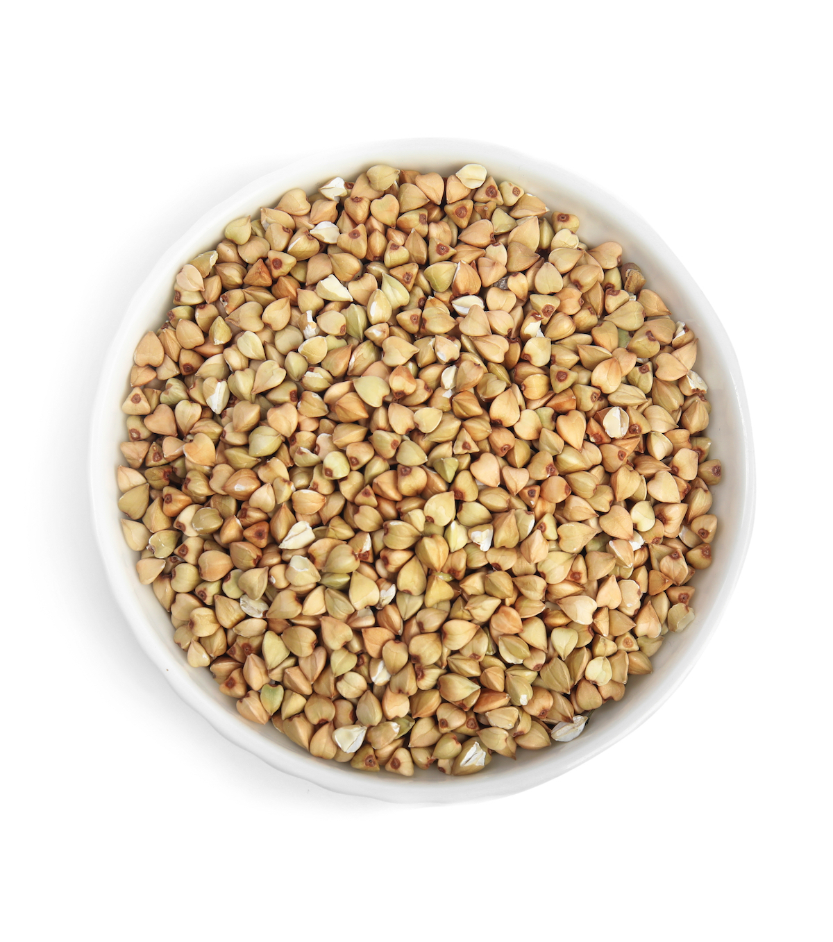 A white bowl full of buckwheat groats on a white background