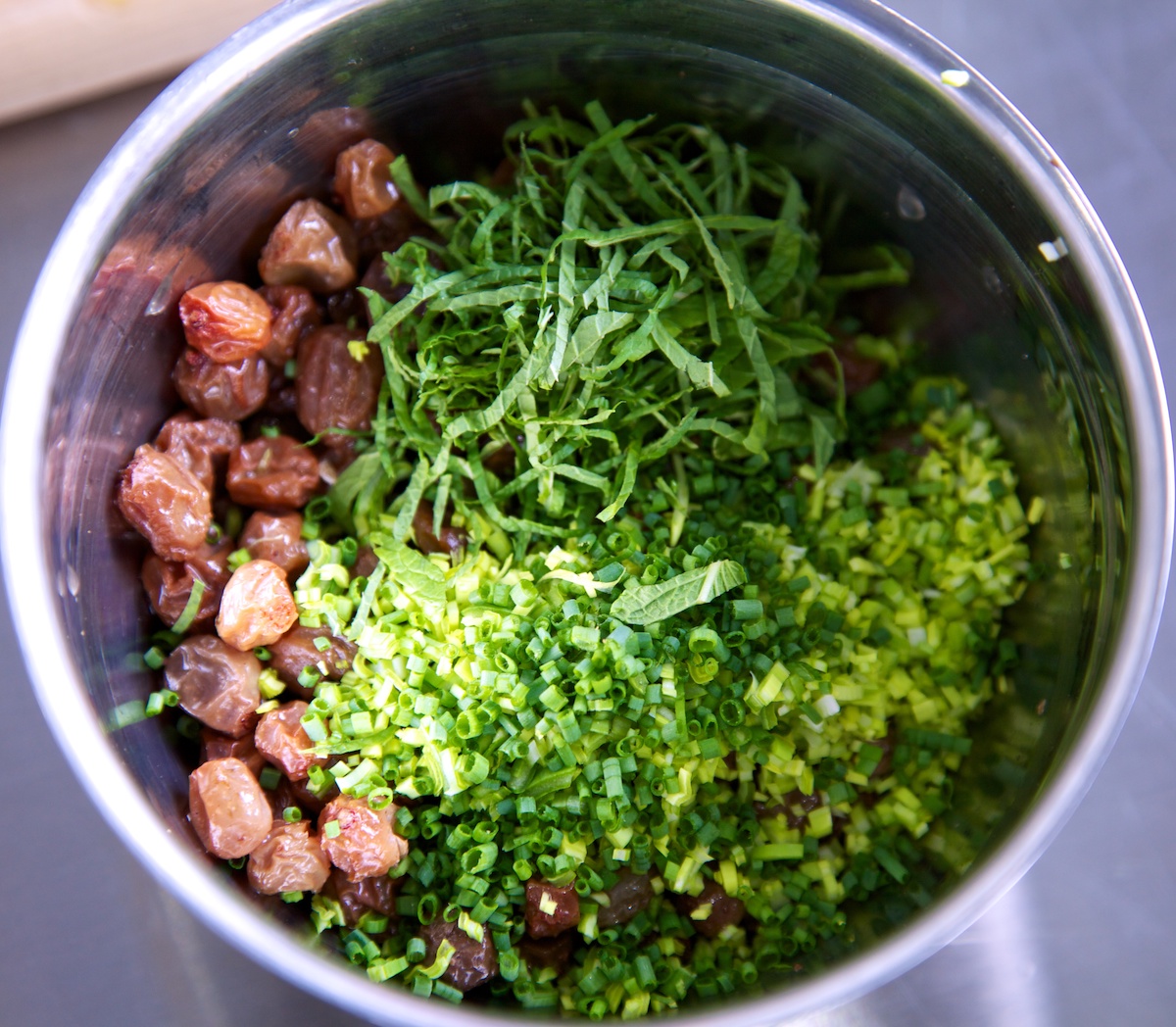 Curried swede risotto ingredients in a silver bowl