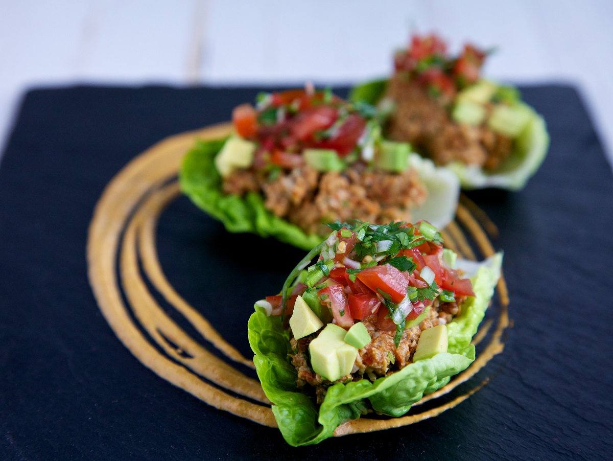 Smoky Maple Sunflower Seed Boats with chipotle cashew sour cream on a slate surface